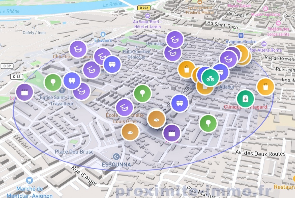Carte de proximité en vue 3D du quartier Champfleury à Avignon, avec des marqueurs de couleur indiquant les commerces, établissements scolaires, arrêts de transports en commun et services de santé à proximité. Le périmètre de recherche est délimité par un cercle bleu centré sur le bien.